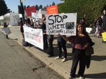 About 50 protesters called for more representation for Latinos in Hollywood outside the Beverly Hilton Hotel, where the Academy Awards luncheon was being held.