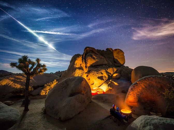 The regularly scheduled evening camping shot that I had planned for our time in 
Joshua Tree was made infinitely more exciting when a meteor exploded in the sky just 
after I had triggered a 30 second exposure on my camera. The resulting image is a 
stroke of good luck that, as a photographer, you dream of, but never expect to actually 
have happen. This was truly a once in a lifetime shot. Joshua Tree National Park, 
California.