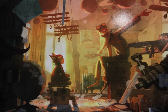 Page in a book of concept art for "The Little Prince" kept inside the "magic suitcase" used for pitching investors and artists, cast and crew.