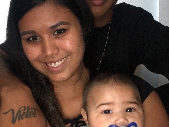 Anthony Weber with Stephanie Valencia and their daughter Violet.