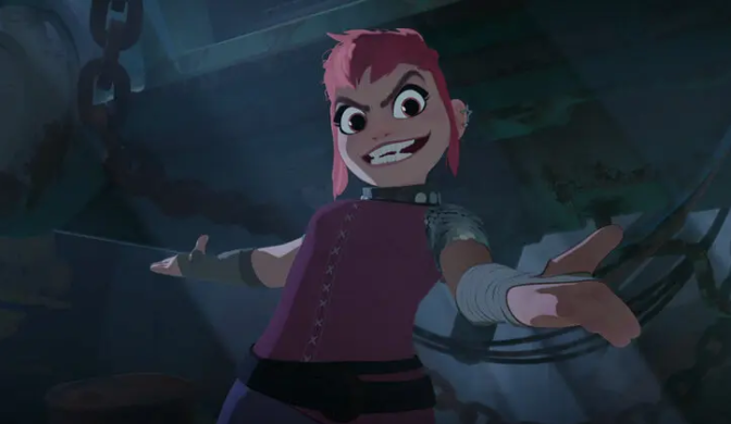 Nimona, a pink-haired, young girl, stands in a dark room. She wears a pink shirt that matches her hair. It has armored shoulders and a high neck collar. Nimona also wears arm guards that cover her forearms but leave her fingers and thumbs exposed. She flashes a toothy smile that shows off her fangs. Her eyes are wide and menacing. Her arms are spread out at her sides gesturing to the room around her as if showing off the space to the viewer. 