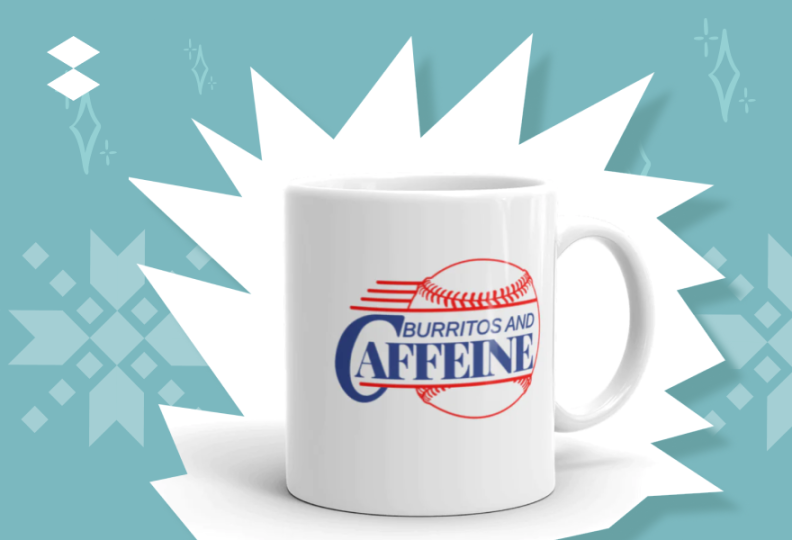 A white ceramic mug with blue and white lettering