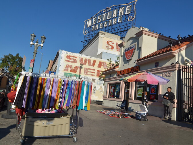 On Alvarado Street across from MacArthur Park vendors set up shop to sell clothing, technology and more.  