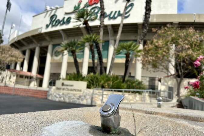 A drinking fountain is shown at the entrace to the Rose Bowl Stadium.