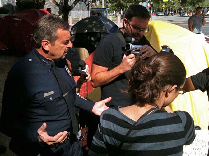 LAPD Chief Charlie Beck speaks to reporters at Occupy L.A.