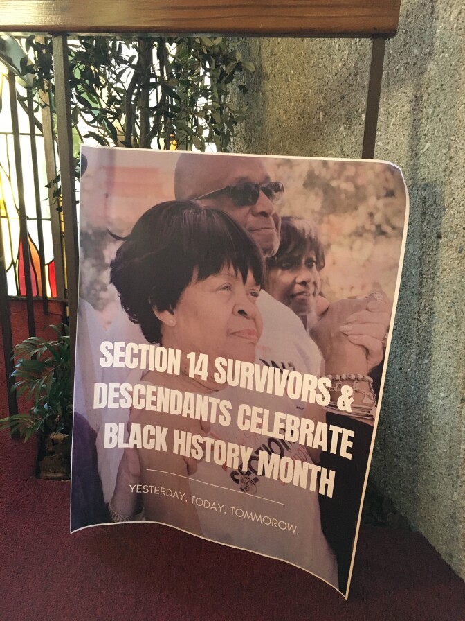 A poster reads "Section 14 Survivors & Descendants Celebrate Black History Month."