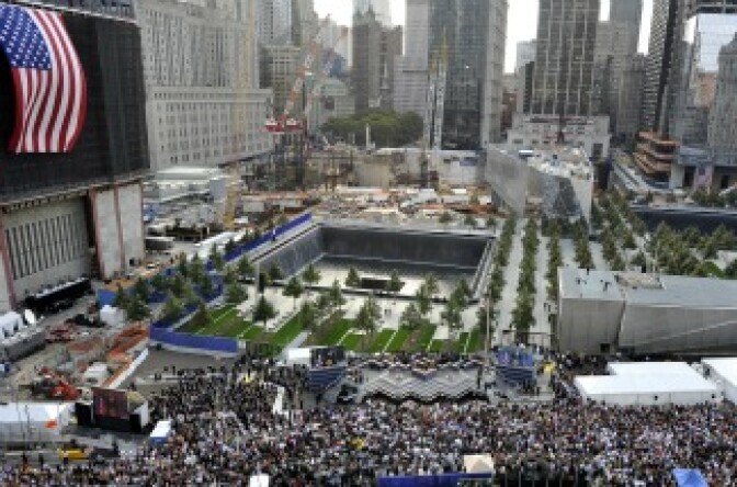 US President Barack Obama addresses the relatives at the 9/11 memorial in New York, September 11, 2011, during the official ceremony marking the 10th anniversary of the terrorist attack.