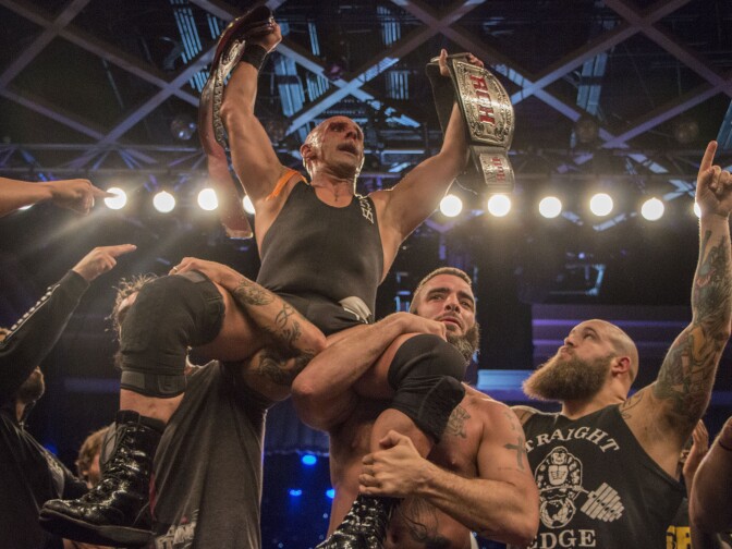 Wrestlers celebrate with Christopher Daniels after he wins the Ring Of Honor world championship on March 10, 2017.