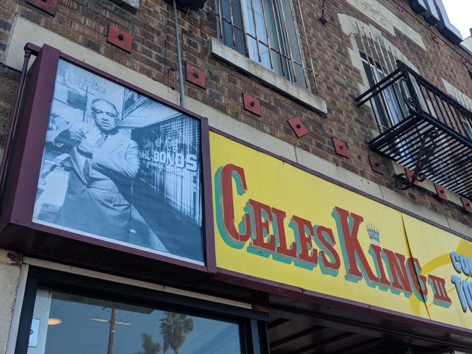 Celes King III's bail bonds business is located at the corner of MLK Blvd and Denker Av, where it's been converted into a community hall featuring his name and picture.