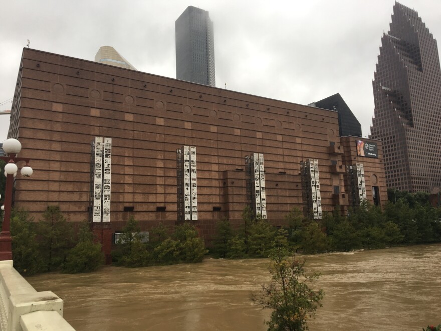 Floodwaters from Buffalo Bayou were still high mid-week, lapping against the side of the Wortham Theater Center, one of the main venues of Houston’s Theater District.