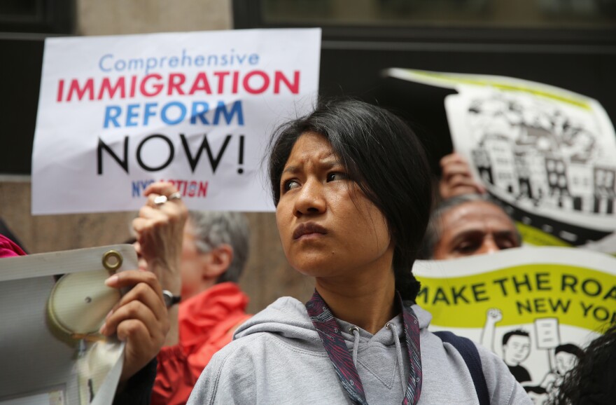 Immigration reform advocates stage a demonstration outside a detention facility run by Immigration and Customs Enforcement (ICE) on June 14, 2013 in New York City. Demonstrators staged the event ahead of Fathers' Day to draw attention to the thousands of undocumented immigrant fathers deported by ICE and separated from their families in the United States.  