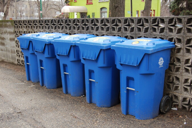 Blue recycling bins.