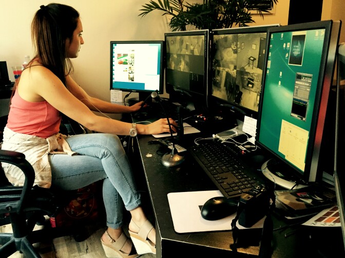 Manager Jo Manojlovic monitors gamers at Room Escape Los Angeles