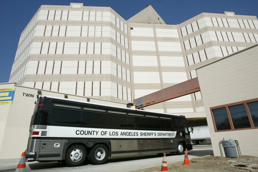 LOS ANGELES - OCTOBER 15:  A Los Angeles County Sheriff's Department prisoner transport bus pulls into the Twin Towers Correctional Facility October 15, 2003 in Los Angeles, California. More than 250 sheriff's deputies participated in a sickout today and more than 20 percent of the labor force at the Men's Central Jail called in sick last night. Meanwhile, about 2,000 Amalgamated Transit Union members employed by the Metropolitan Transportation Authority are on strike, halting service for about 500,000 bus and train riders across Los Angeles County. Teamsters members announced this afternoon that they will honor picket lines set up by striking employees of three major supermarket chains in southern California.  (Photo by David McNew/Getty Images)