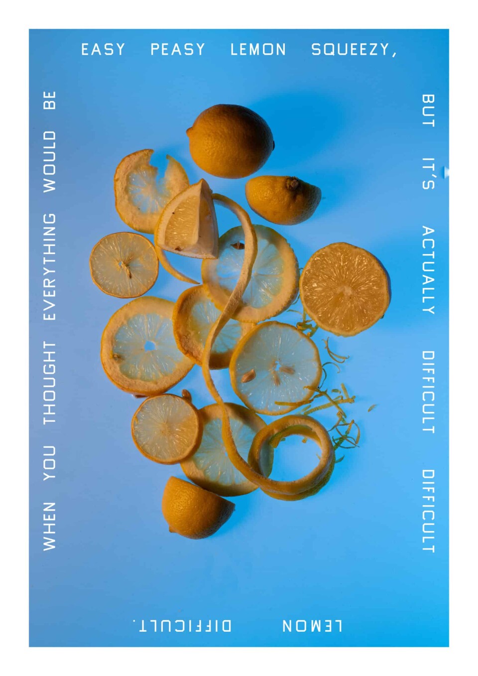 Slices of lemon on a blue poster. 