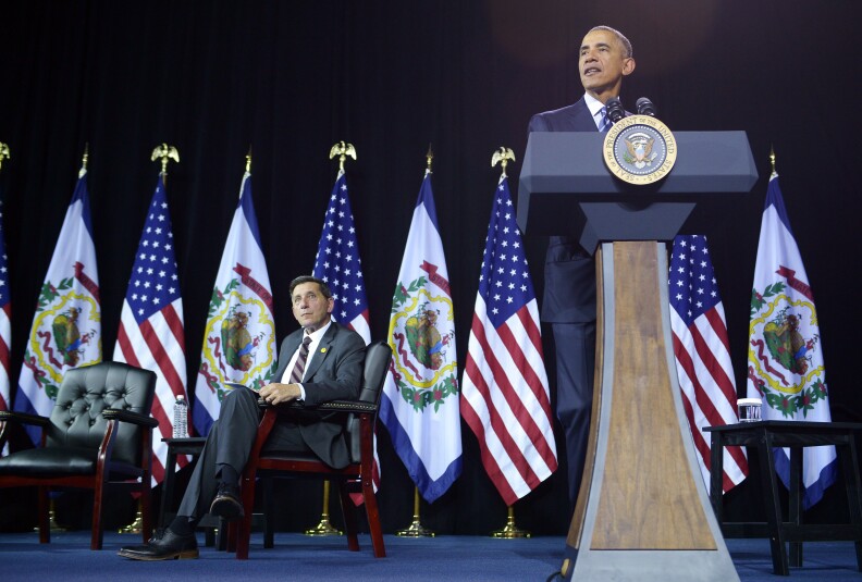 US President Barack Obama speaks on drug abuse at the East End Family Resource Center on October 21, 2015 in Charleston, West Virginia. At right is Director of National Drug Control Policy Michael Botticelli. AFP PHOTO/MANDEL NGAN        (Photo credit should read MANDEL NGAN/AFP/Getty Images)