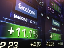 NEW YORK, NY - MAY 18: The share price of newly debuted Facebook stock is seen at the Nasdaq stock market moments after it went public on May 18, 2012 in New York, United States. The social network site began trading after 11:30 a.m. with shares jumping 13% to $43 before quickly falling. On Thursday Facebook priced 421 million shares at $38 each. Facebook, a Menlo Park, California based company, will have a valuation exceeding $100 billion.  (Photo by Spencer Platt/Getty Images)