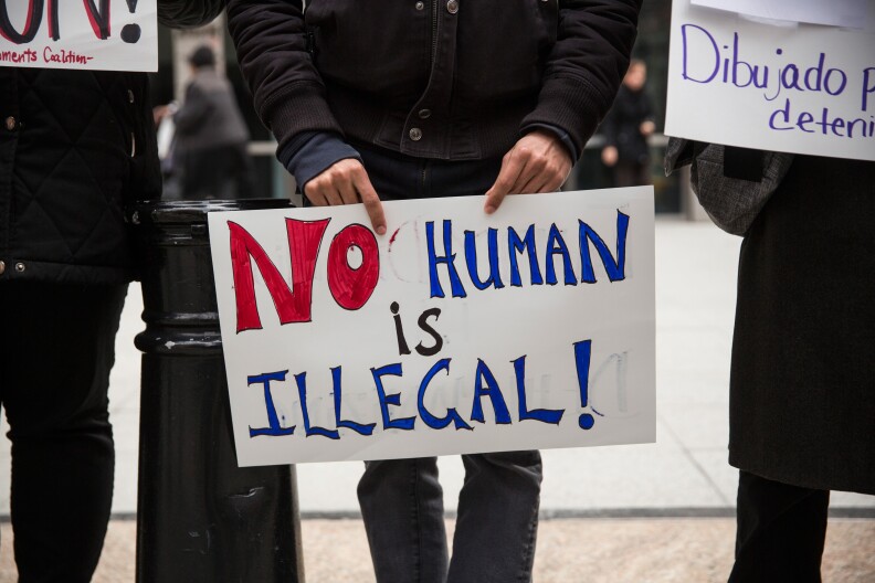 NEW YORK, NY - MARCH 24:  Activists protest for the release of families held in detention centers in Texas and for the closing of the family detention centers on March 24, 2015 in New York City. The protesters rallied outside the Jacob K Javits Federal building, where immigration offices are located.  (Photo by Andrew Burton/Getty Images)
