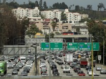 Traffic moves slowly on the 110 Freeway during afternoon rush hour in downtown Los Angeles on May 6, 2015. 