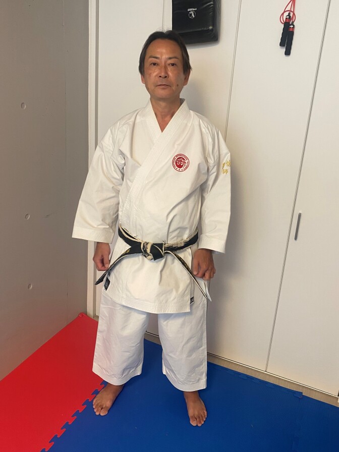 Kenshin Iwata poses inside his dojo in Tokyo. He says in karate, the body is a weapon. "It's what we call the art of killing with one blow," he says.