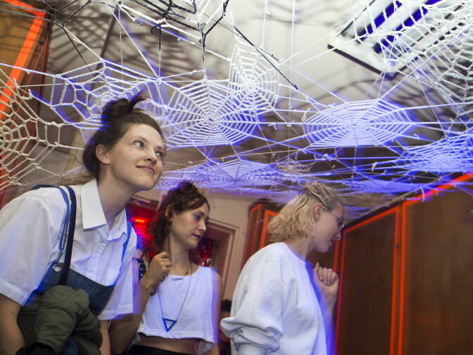Marty Windahl, left, and Marisa Suarez-Orozco walk through a room dedicated to internet trolls inside KillJoy's Kastle: A Lesbian Feminist Haunted House on Friday, Oct. 16, 2015 in West Hollywood. The room was specifically made for the Los Angeles version of the haunted house.