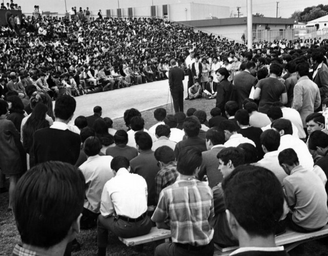 Garfield High School students gather for a special assembly on March 7, 1968, as principal Reginald Murphy (center) appeals to students to return to class.
