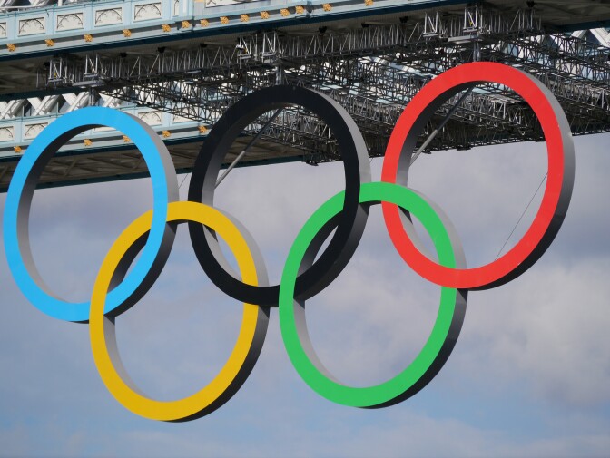 The Olympic rings on Tower Bridge in England.