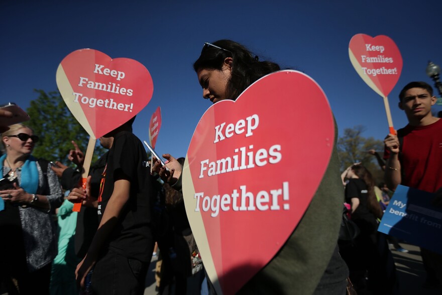 WASHINGTON, DC - APRIL 18:  Pro-immigration activists hold signs as they gather in front of the U.S. Supreme Court on April 18, 2016 in Washington, DC. The Supreme Court is scheduled to hear oral arguments in the case of United States v. Texas, which is challenging President Obama's 2014 executive actions on immigration - the Deferred Action for Childhood Arrivals (DACA) and Deferred Action for Parents of Americans and Lawful Permanent Residents (DAPA) programs.  (Photo by Alex Wong/Getty Images)