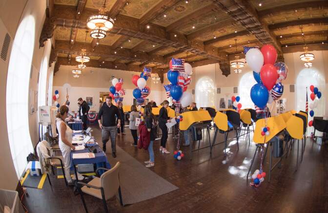 Residents cast their ballots during the Democratic presidential primary in Beverly Hills, California on Super Tuesday, March 3, 2020. - Thirteen states and American Samoa are holding presidential primary elections, with over 1400 delegates at stake. Americans vote Tuesday in primaries that play a major role in who will challenge Donald Trump for the presidency, a day after key endorsements dramatically boosted Joe Biden's hopes against surging leftist Bernie Sanders. The backing of Biden by three of his ex-rivals marked an unprecedented turn in a fractured, often bitter campaign. (Photo by Mark RALSTON / AFP) (Photo by MARK RALSTON/AFP via Getty Images)
