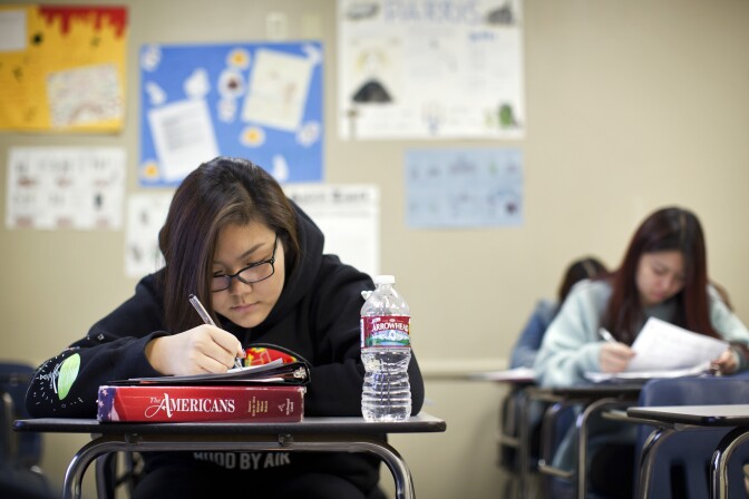 Junior Lavinia Sigin does her AP Chinese homework after school at Arroyo Pacific Academy in Arcadia on Thursday, Nov. 12, 2015.