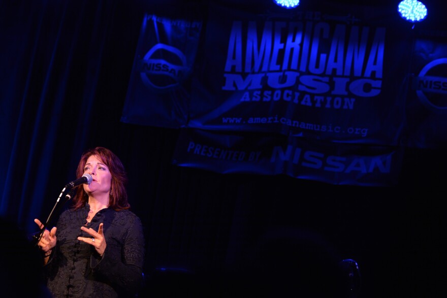 Rosanne Cash's latest album is titled "She Remembers Everything."