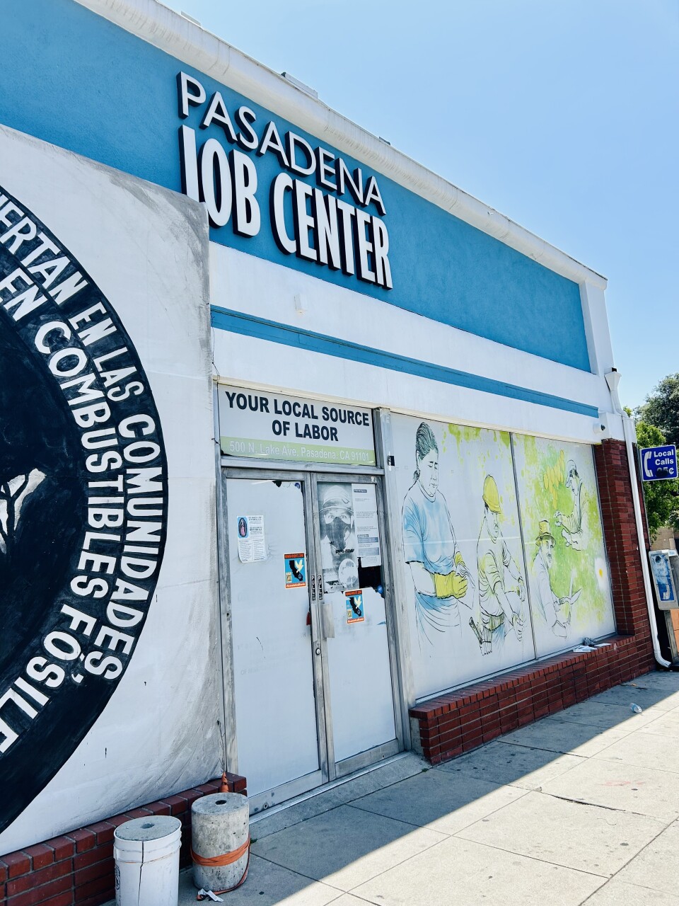 A storefront with a sign that says, "Pasadena Job Center."