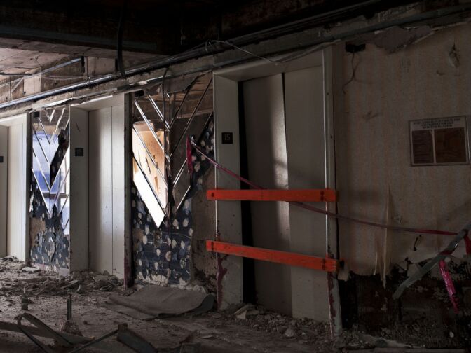 Mirrors decorating elevators on the 15th floor are still left through the deconstruction.