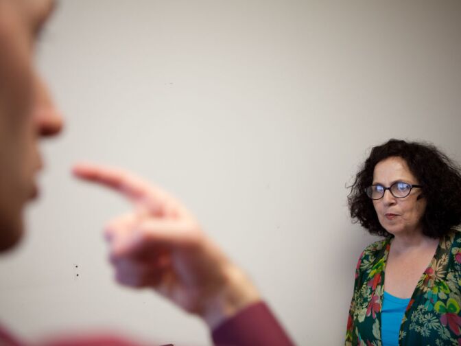 Voice therapist Robert Dowhy teaches Carol Ann Susi proper voice techniques. Voice training can teach how to properly use your vocal cords while widening your inflection range.