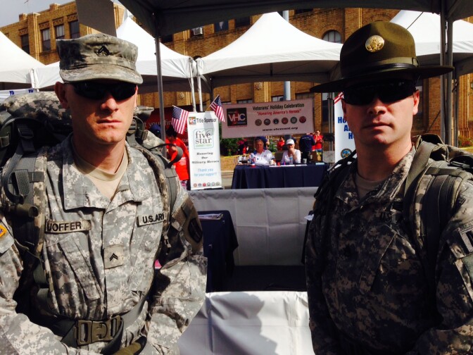 Army drill sergeant Peter Nuoffer, right, decided to participate in a Memorial Day 5K wearing his full uniform and backpack to show support for families who have lost loved ones. 