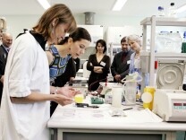 Research officer Therese Becker works with instruments detecting melanoma DNA at the Cancer Research Foundation at the Westmead Hospital.