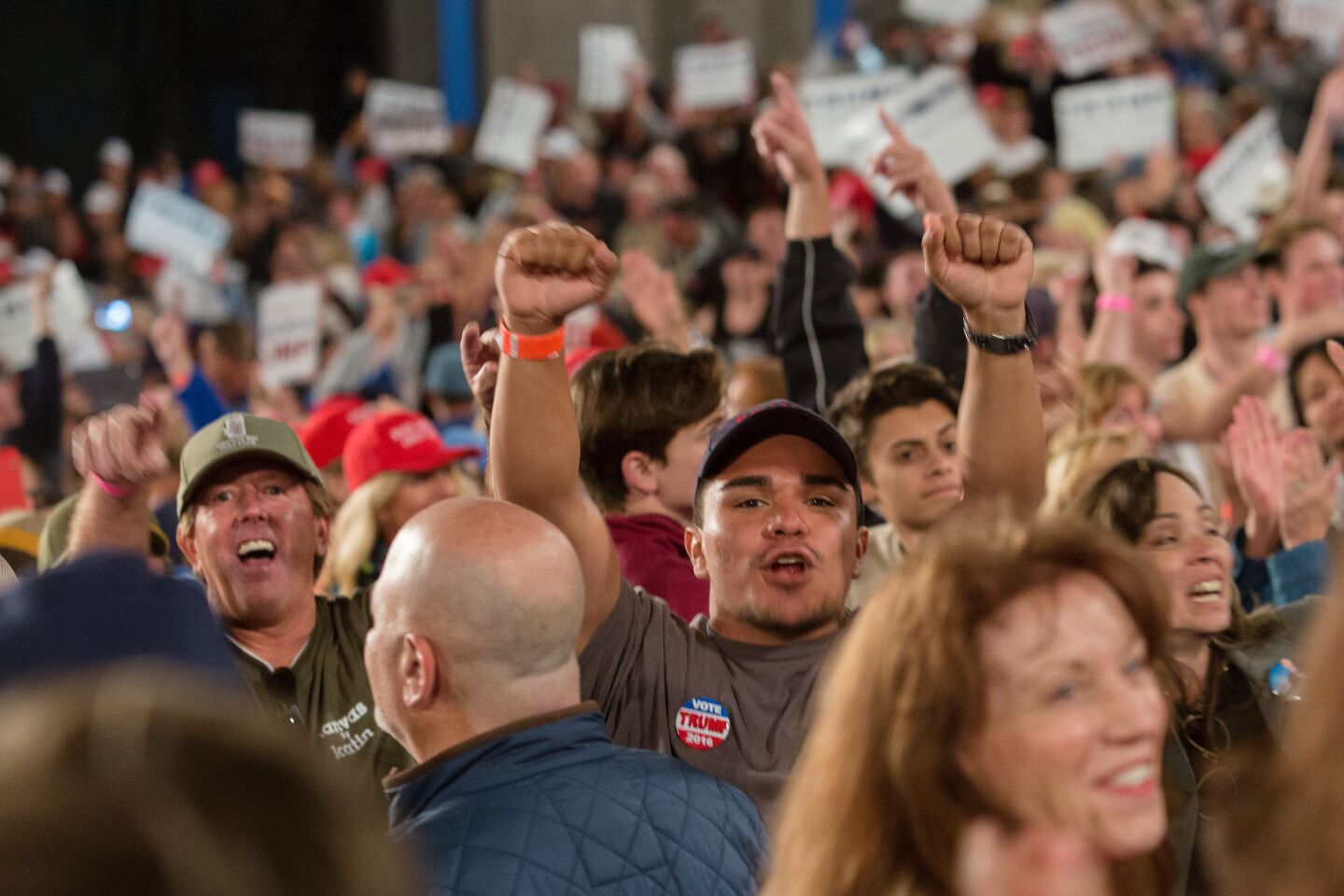 Supporters of Republican presidential candidate Donald Trump jeer at members of the press at the encouragement of the candidate during his campaign rally at the Orange County Fair and Event Center, April 28, 2016, in Costa Mesa, California. 
Trump is vying for votes in the June 7 California primary election in hope of narrowing the gap to the 1,237 delegates needed to win the Republican presidential nomination. / AFP / DAVID MCNEW        (Photo credit should read DAVID MCNEW/AFP/Getty Images)