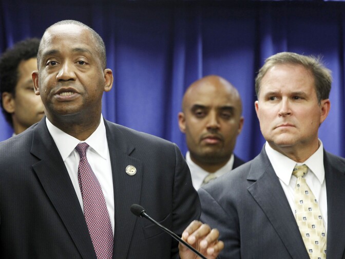 U.S. Attorney Andre Birotte, left, and FBI Assistant Director in Charge Bill Lewis speak at news conference Friday, Feb. 21, 2014, in Los Angeles. Federal law enforcement authorities on Friday announced multiple charges of bribery and cover-ups against state Sen. Ron Calderon, a Democratic state lawmaker and his brother, the result of a long-running corruption investigation that has tarnished the state's majority party.