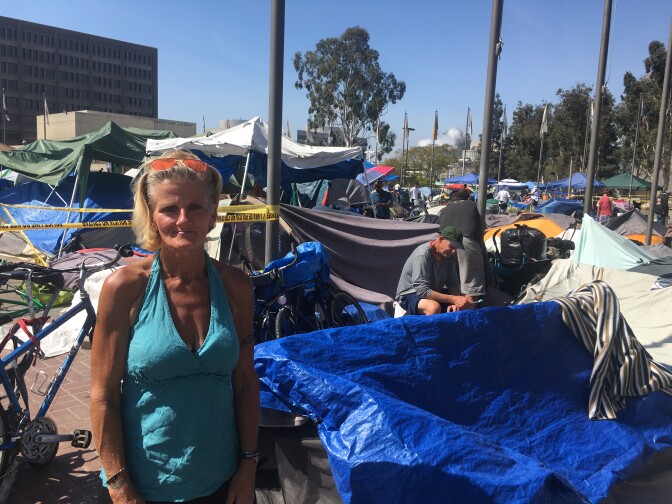 Mona Corman in Santa Ana’s Plaza of the Flags on March 30, 2018. "Even with the drama and the constant chaos, I feel a sense of connection," she told KPCC.