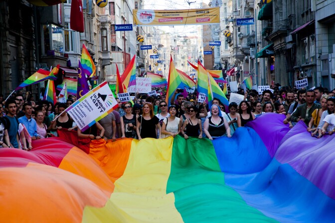 Gay and human rights activists march during anti-government protests on Istiklal Street, the main shopping corridor on June 23, 2013 in Istanbul.  