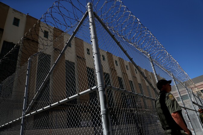 SAN QUENTIN, CA - AUGUST 15:  An armed California Department of Corrections and Rehabilitation (CDCR) officer stands guard at San Quentin State Prison's death row on August 15, 2016 in San Quentin, California.  San Quentin State Prison opened in 1852 and is California's oldest penitentiary. The facility houses the state's only death row for men that currently has 700 condemned inmates.  (Photo by Justin Sullivan/Getty Images)