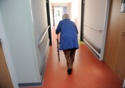 An elderly woman walks with a walker on December 29, 2011 at an old people's home near Montauban, south western France. AFP PHOTO / ERIC CABANIS (Photo credit should read ERIC CABANIS/AFP/Getty Images)