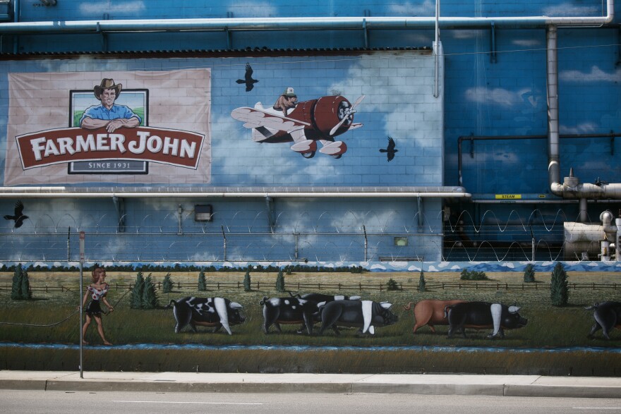 The Farmer John pork-packing plant in Vernon features a pig-themed mural painted by artist Les Grimes.
