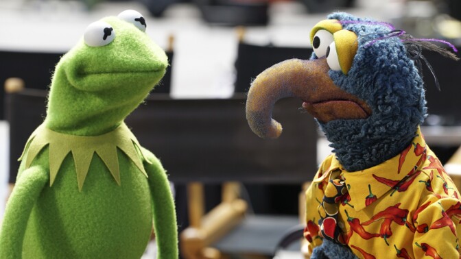 Kermit the Frog speaks to Gonzo the Great in a scene from ABC's "The Muppets."