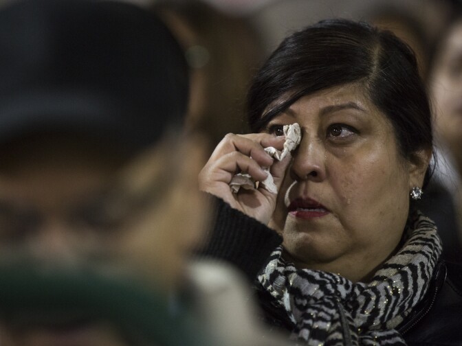 "When they attack one of us, they attack all of us," San Bernardino Mayor Pro Tem Rikke Van Johnson said during a vigil at San Manuel Stadium in San Bernardino on Thursday night, Dec. 3, 2015 following a mass shooting that left 14 people dead and 21 injured on Wednesday at the Inland Regional Center.