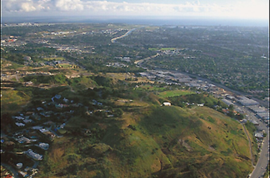 Aerial of Baldwin Hills Scenic Overlook with the Ballona Creek winding through Culver City to the Ballona Wetlands and emptying into the Pacific Ocean at Marina Del Rey.