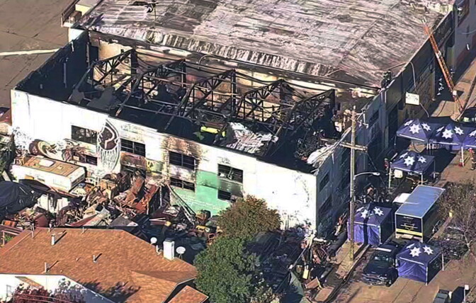 This Dec. 3, 2016 image from video provided by KGO-TV shows the Ghost Ship Warehouse after a fire swept through the Oakland, Calif., building. Dozens of people are confirmed dead with the toll expected to rise.