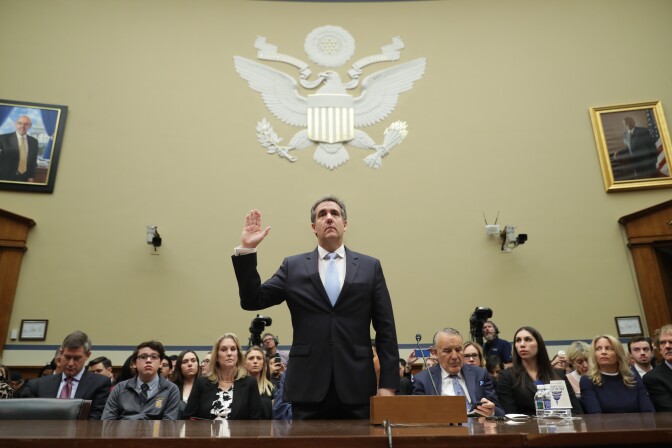 WASHINGTON, DC - FEBRUARY 27: Michael Cohen, former attorney and fixer for President Donald Trump is sworn in before testifying before the House Oversight Committee on Capitol Hill February 27, 2019 in Washington, DC. Last year Cohen was sentenced to three years in prison and ordered to pay a $50,000 fine for tax evasion, making false statements to a financial institution, unlawful excessive campaign contributions and lying to Congress as part of special counsel Robert Mueller's investigation into Russian meddling in the 2016 presidential elections. (Photo by Chip Somodevilla/Getty Images)