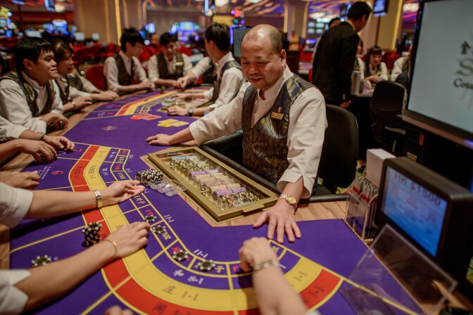This picture taken on September 19, 2012 shows a Sands casino employees during training in Macau. Las Vegas casino boss Sheldon Adelson unveiled plans September 20, 2012 to build a scaled down replica of the Eiffel Tower as part of a new 3 billion USD gambling resort in Macau. 