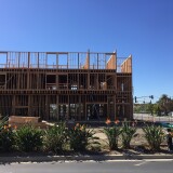 Construction is ongoing in an area with lots of shopping just off the 405 Freeway along Edinger Avenue in Huntington Beach. Nearby at Edinger Avenue and Beach Boulevard, a site was proposed for new affordable housing units.